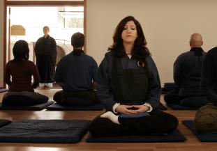 Becca Topol, meditating at the Santa Monica Zen Center in California, says commingling her Jewish faith and Buddhism has deepened her spirituality.