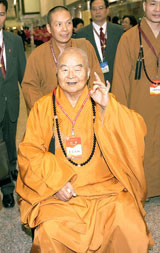 Buddhist Master Hsing Yun poses at the World Buddhist Forum in Taipei yesterday.