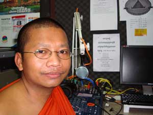 Monk Vong Savuth seen in his studio at 106.25 FM, where he offers up daily life lessons to the masses.