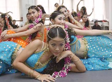 The palace court dancers trying very hard to impress Prince Siddhartha during the full dress rehearsal for the musical.