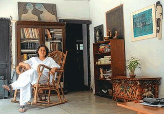 Photo: Prime Minister Manmohan Singh's daughter Upinder in her modest home in the St. Stephen's staff quarters, Delhi. / Outlook
