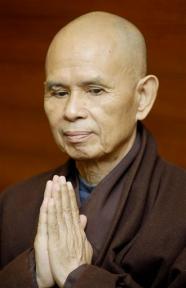 March 20, 2007 file photo, Vietnamese Zen master Thich Nhat Hanh, greets upon his arrival at Suvarnabhumi international airport in Bangkok, Thailand.