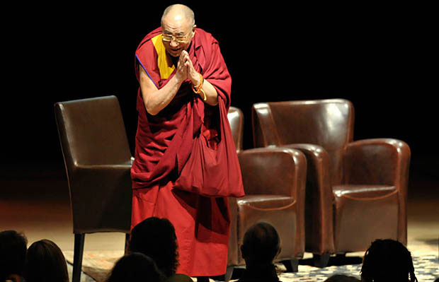The Dalai Lama greets the crowd attending the afternoon session of the Vancouver Peace Summit at UBC's Chan Centre on September 27.