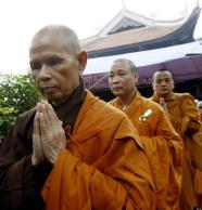 Zen Buddhist monk leader Thich Nhat Hanh (front) prays at a requiem for Vietnam War victims near Hanoi
