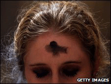 An ash cross on the forehead during worship on Ash Wednesday