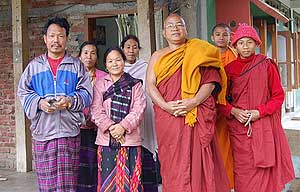A Tikhak family with monks. The Tikhak Tangsa tribe is under severe pressure to convert to Christianity by fundamentalists with the help of local militants
