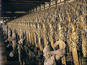 Part of the 1000 images of the Kannon Bodhisattva at Sanjusangen-do Temple. Some of the 28 attendants or Guardian Deities can be seen in the front row.