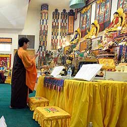 David T. Foster, III Worshippers bow and kneel during services at the Charlotte True Buddha Temple on Monroe Road on Sunday, November 30, 2014.