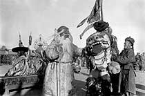 The White Old Man taming a lion at the Tsam festival in Ulaan Baatar (before 1937)