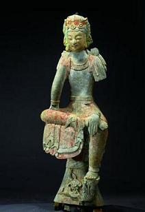 Bodhisattva assis. Grès avec des traces de polychromie. Fin des Wei de l'Est - début des Qi du Nord