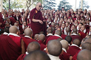 His Holiness the Dalai Lama speaks encouragingly to hundreds of exiled Tibetan Buddhist nuns in India about the importance of their roles in preserving the Buddhist teachings and as future teachers. (Photo taken on Nov 3, 2013 by Tenzin Choejor, Office of His Holiness the Dalai Lama)